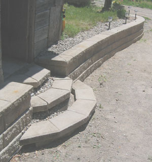 Long walls can be broken up with curved steps and other highlights. 